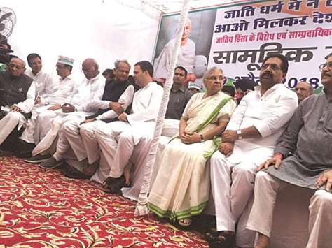 Congress president Rahul Gandhi and other party leaders stage a day-long hunger strike at Rajghat in New Delhi yesterday.