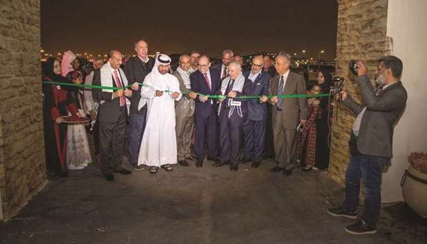 OPENING: Katara general manager Dr Khalid bin Ibrahim al-Sulaiti cuts the ribbon to officially inaugurate the festival.