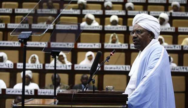 Sudanese President Omar al-Bashir addresses parliament in the capital Khartoum on April 1, 2019 in his first such speech since he imposed a state of emergency across the country