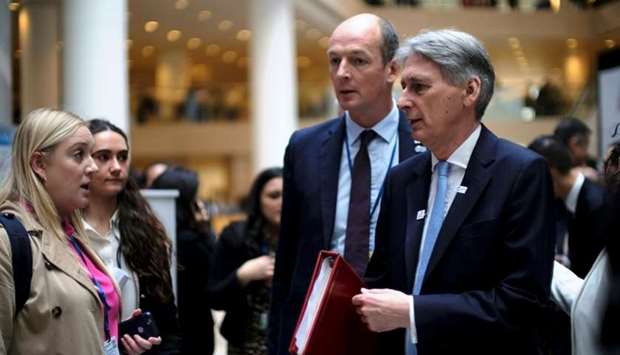 Britain's Chancellor of the Exchequer Philip Hammond arrives for a G-20 Finance Ministers and Central Bank Governors' meeting at the IMF and World Bank's 2019 Annual Spring Meetings, in Washington
