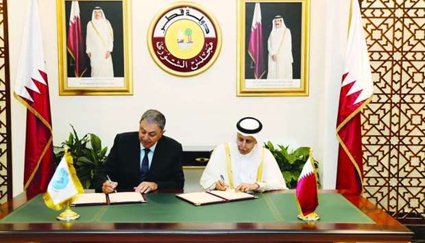 HE the Speaker of the Advisory Council Ahmed bin Abdulla bin Zaid al-Mahmoud, and the President of GRULAC in IPU, Rodolfo Urtubey, signing the memorandum of co-operation in Doha.
