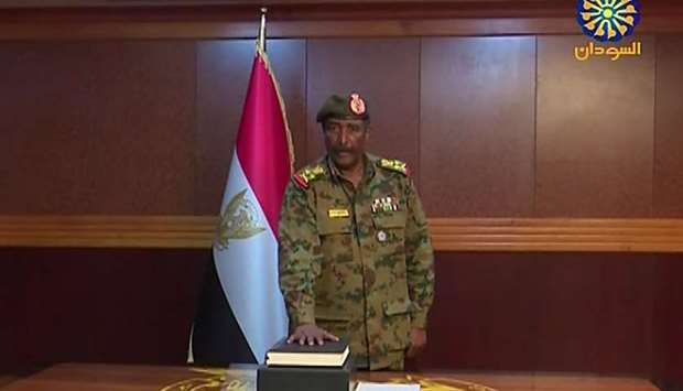 A grab from a broadcast on Sudan TV shows General Abdel Fattah al-Burhan Abdulrahman taking oath on April 12, 2019 as chief of the new military council, in the capital Khartoum. AFP /HO/SUDAN TV