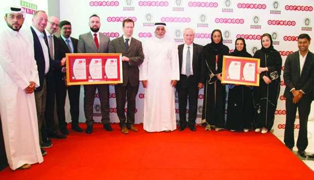 Ooredoo COO Yousuf Abdulla al-Kubaisi received the certificate from Pascal Fornage, head of Economic Department at the French embassy, in the presence of Ooredoo executives and Bureau Veritas county chief executive Selim Kseib.
