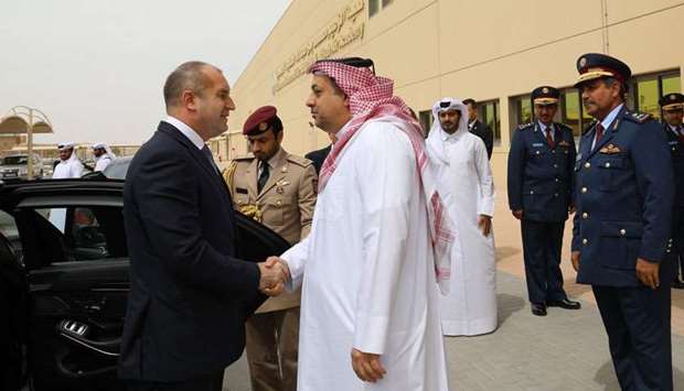 Bulgarian President Rumen Radev and the accompanying delegation being welcomed by HE the Deputy Prime Minister and Minister of State for Defence Affairs, Dr Khalid bin Mohamed al-Attiyah at the Al Zaeem Mohamed Bin Abdullah Al Attiyah Air College.
