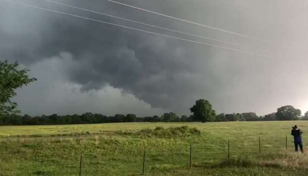A view of clouds, part of a weather system seen from near Franklin, Texas, U.S., in this still image from social media video dated April 13, 2019. TWITTER @DOC_SANGER/via REUTERS