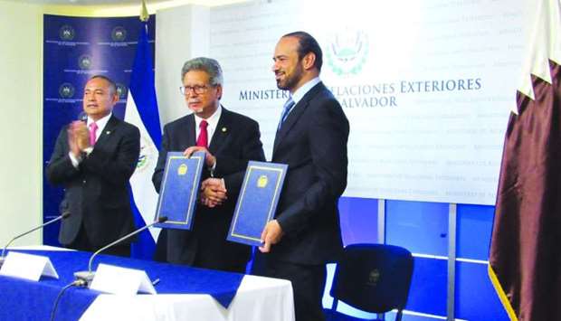 Charge d'Affaires of the embassy of Qatar in El Salvador, Tariq Othman al-Othman with the Minister of Foreign Affairs of El Salvador, Carlos Castaneda at memorandum signing ceremony in San Salvador.