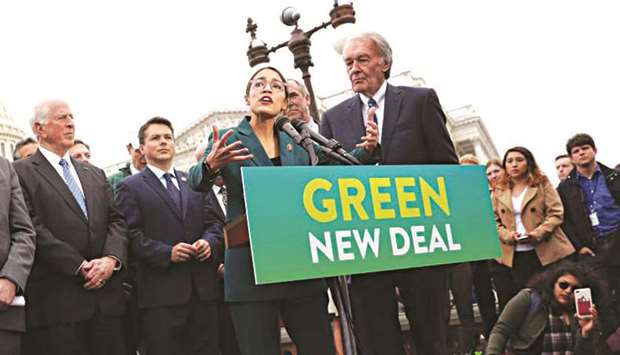 File picture of US Representative Alexandria Ocasio-Cortez (D-NY) and Senator Ed Markey (D-MA) holding a news conference for their proposed u201cGreen New Dealu201d to achieve net-zero greenhouse gas emissions in 10 years, at the US Capitol in Washington, on February 7, 2019.
