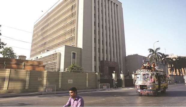 The State Bank of Pakistan building in Karachi. Despite a reduction in the current account deficit, and with total foreign exchange reserves at over $17bn as recorded on March 29, the central bank was forced to intervene in the currency market to curb speculative trading.