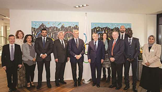 HE Qatar Olympic Committee (QOC) President Sheikh Joaan bin Hamad al-Thani (fourth from left) with delegates at the Olympic Refuge Foundation meeting in Lausanne, Switzerland, on Monday. At bottom HE Sheikh Joaan is seen with IOC President Dr Thomas Bach.
