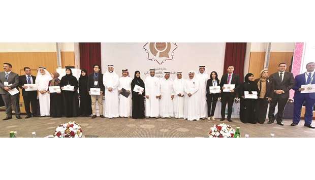 The award winners with HE Sheikh Faisal bin Qassim al-Thani, Dr Hassan al-Derham and other dignitaries.