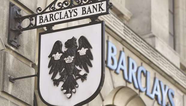 A Barclays sign hangs outside a branch of the bank in the City of London. Barclays and BNP Paribas, facing stronger competition from shadow banks for the lucrative business of lending to riskier companies, are considering setting up US funds to finance the transactions.