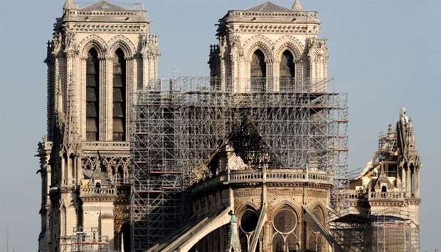 View of the rear of Notre-Dame Cathedral after a massive fire devastated large parts of the gothic structure in Paris