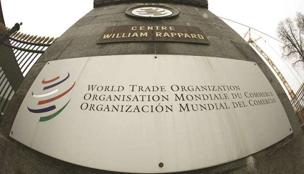 The WTO logo is pictured at the entrance to its headquarters in Geneva (file). The WTO decided that China didnu2019t automatically qualify for market-economy status in 2016 as Beijing has asserted, according to two people with knowledge of the case, handing a major victory to the European Union and US.