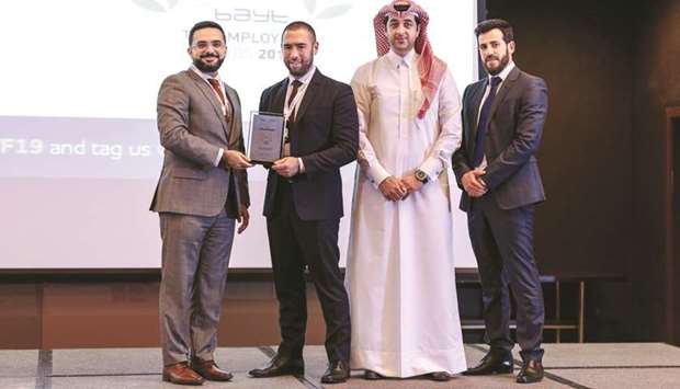 The Qatar Airways recruitment team receiving the award.