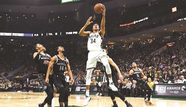 NBA playoffs: Antetokounmpo triple-double helps Bucks crush Celtics in Game  1 