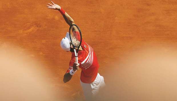 Serbiau2019s Novak Djokovic in action during his third round match against Taylor Fritz of the US at the Monte Carlo Masters in Monaco, Principality of Monaco, yesterday. (Reuters)