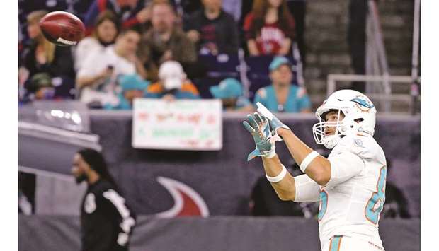 Miami Dolphins tight end Mike Gesicki warms up before action against the Houston Texans at the NRG Stadium in Houston on October 25, 2018. (Miami Herald/TNS)