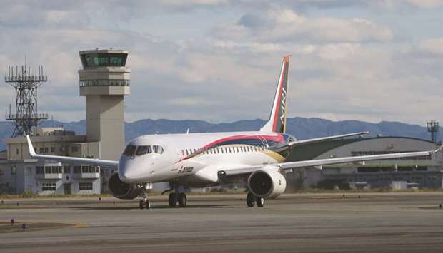 Mitsubishi Aircraft Corpu2019s Mitsubishi Regional Jet (MRJ) touches down following its first flight at Nagoya Airport in Toyoyama Town, Aichi Prefecture, Japan (file). The first airliner built in Japan since the 1960s, began certification flights last month in Moses Lake, Washington, to satisfy that demand.