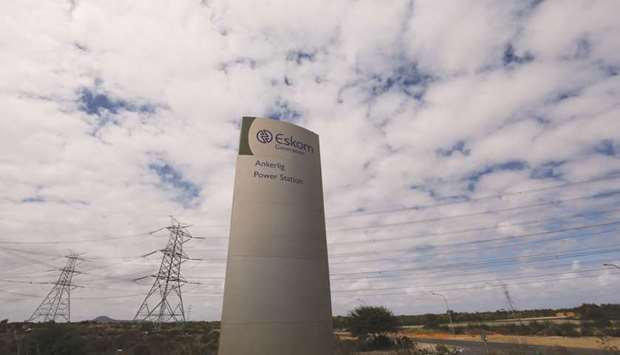 Pylons carry electricity from a sub-station of state power utility Eskom outside Cape Town (file). Rating companies have cited Eskom as one of the biggest risks to the sovereign.