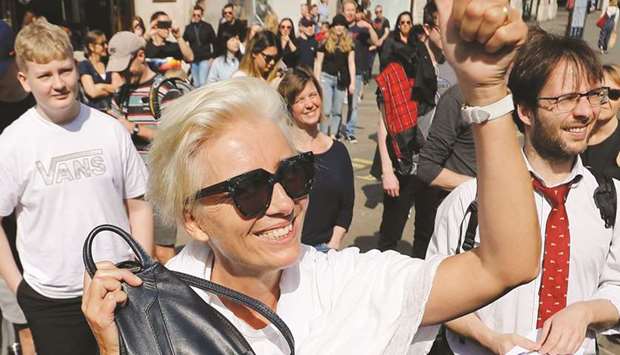 Actress Emma Thompson gestures as she joins climate change activists occupying the road junction at Oxford Circus in central London yesterday.