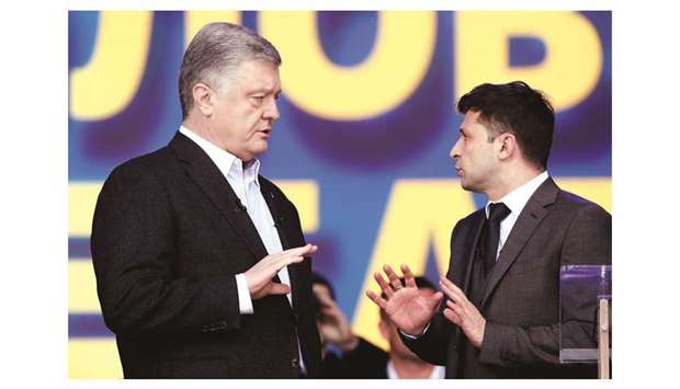 Poroshenko and Zelenskiy during the debate held at the Olimpiyskiy stadium in Kyiv.