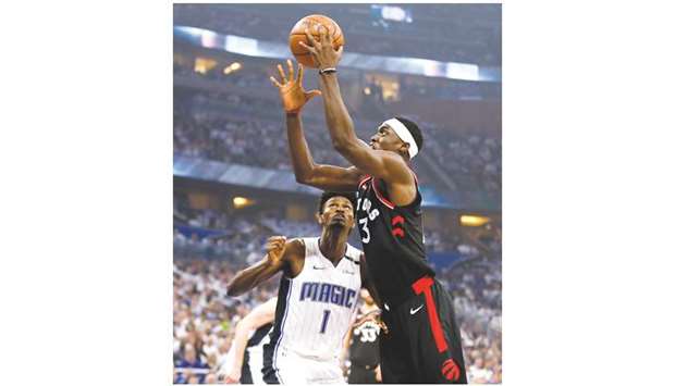 Toronto Raptors forward Pascal Siakam (right) drives to the basket against Orlando Magic forward Jonathan Isaac during the first quarter of game three of the first round of the 2019 NBA Playoffs in Orlando, United States, on Friday. (USA TODAY Sports)
