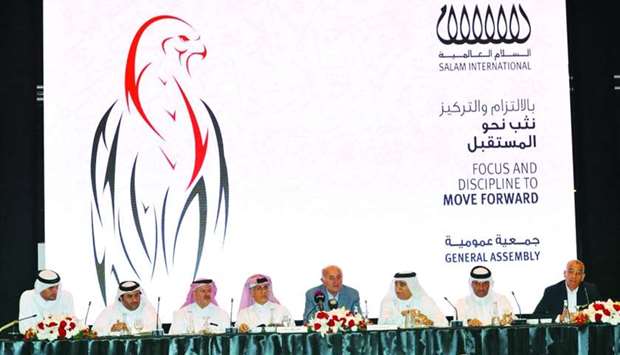 Issa and other SIIL directors at the company's extraordinary general assembly meeting in Doha on Monday.