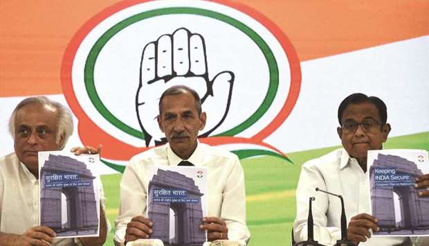Former Northern Army Commander Lt Gen D S Hooda (centre) and former ministers Jairam Ramesh (left) and P Chidambaram release the Congress Partyu2019s national security plan at a press conference in New Delhi yesterday.