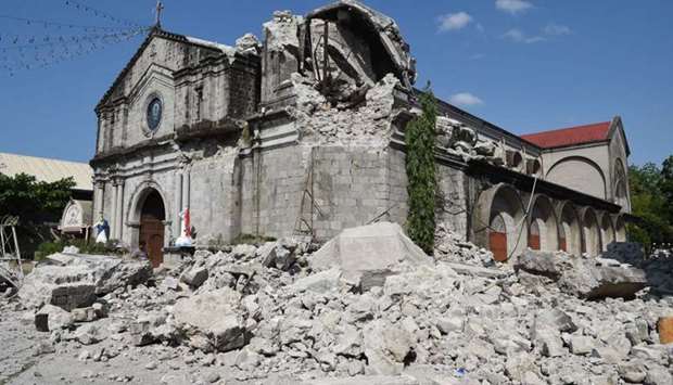 The 18th century St. Catherine of Alexandria church is seen after its bell tower was destroyed following a 6.3 magnitude earthquake that struck the town of Porac, pampanga province