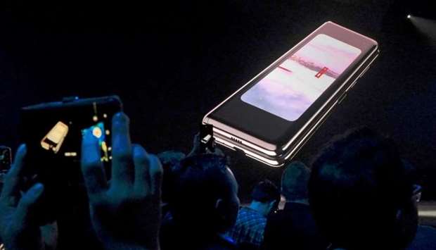 The Samsung Galaxy Fold phone is shown on a screen at Samsung Electronics Co Ltdu2019s Unpacked event in San Francisco, California, US, February 20, 2019