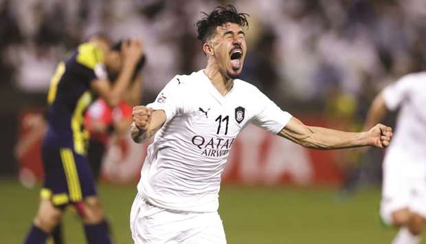 Al Sadd's Baghdad Bounedjah is ecstatic after scoring the winner against Uzbekistanu2019s Pakhtakor in the AFC Champions League Group D match at Al Sadd stadium yesterday. PICTURE: Anas al-Samaraee