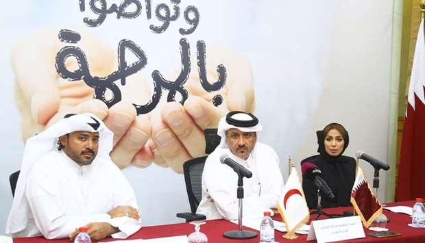 Ibrahim Abdullah al-Maliki, Chief Executive Director of QRCS, Dr Mohamed Salah Ibrahim, Executive Director of Relief and International Development, and Manal Issa al-Fahaid, Consultant for Partner and VIP Donor Relations, at the press conference. PICTURE: Jayan Orma