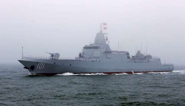 Chinese Navyu2019s 055-class guided missile destroyer Nanchang takes part in a naval parade off the eastern port city of Qingdao, to mark the 70th anniversary of the founding of Chinese People's Liberation Army Navy, China