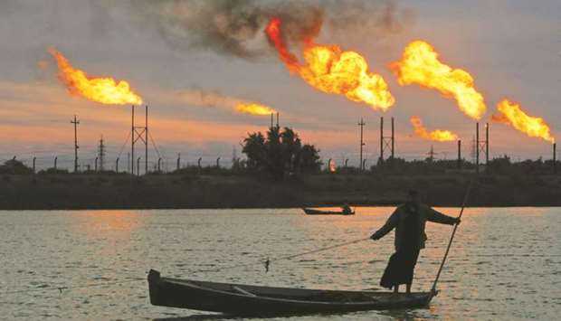 Flames emerge from flare stacks at the oil fields in Basra. Iraq, Opecu2019s second-largest producer, has the capacity to increase its crude oil exports, a top government official told AFP yesterday.