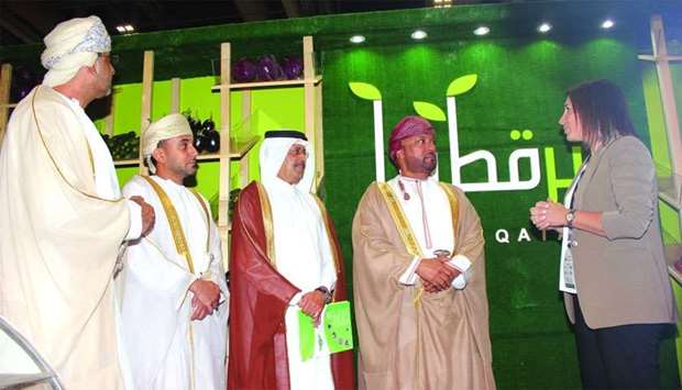 Qatari and Omani officials at the Agro-Food Oman exhibition in Muscat.rnrn