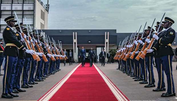 His Highness the Amir Sheikh Tamim bin Hamad al-Thani being accorded a ceremonial send-off at Kigali on Tuesday.