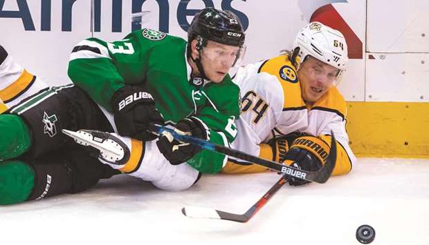 Dallas Stars defenseman Esa Lindell and Nashville Predators centre Mikael Granlund (right) vying for the puck during the third period in game six of the first round of the 2019 Stanley Cup Playoffs at American Airlines Center. PICTURE: USA TODAY Sports