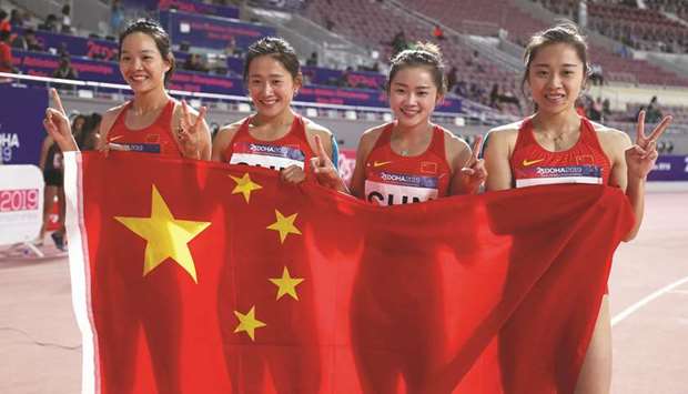 Chinese women celebrate after winning the 4x100m relay gold at the Asian Athletics Championships at the Khalifa International Stadium in Doha yesterday.