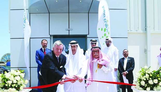 From left: John Crane CEO and division president Jean Vernet; QP Industrial Cities Directorate vice president Abdulaziz al-Muftah, and Al-Ahed co-founder Jaber A al-Sulaiti lead the ribbon-cutting ceremony in the presence of other dignitaries.