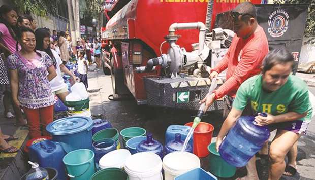 Recent photo shows residents of Barangay Bagong Ilog in Pasig City line up to get water from a tanker during the water crisis that hit parts of Metro Manila in March.