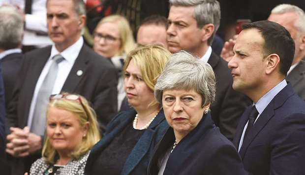 Prime Minister Theresa May, Irelandu2019s Prime Minister Leo Varadkar and Secretary of State for Northern Ireland Karen Bradley attend the funeral of journalist Lyra McKee at St Anneu2019s Cathedral in Belfast, northern Ireland, yesterday.