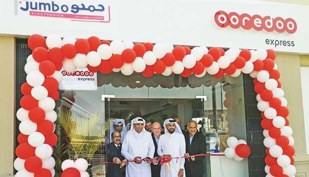 Dignitaries and guests at the opening of the new shop.
