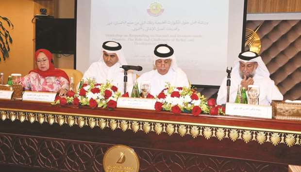 HE Sultan bin Saad al-Muraikhi and other dignitaries at the workshop.