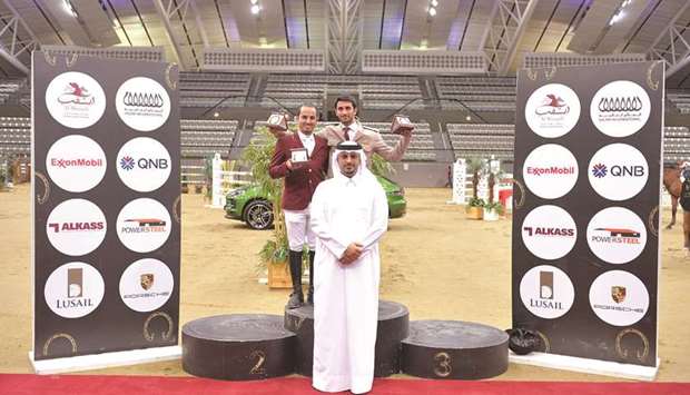 Big Tour winner Salmeen Sultan al-Suwaidi (top right) and runner-up Faleh Suwead al-Ajami pose with Ali al-Rumaihi, Tournament Director of Hathab.
