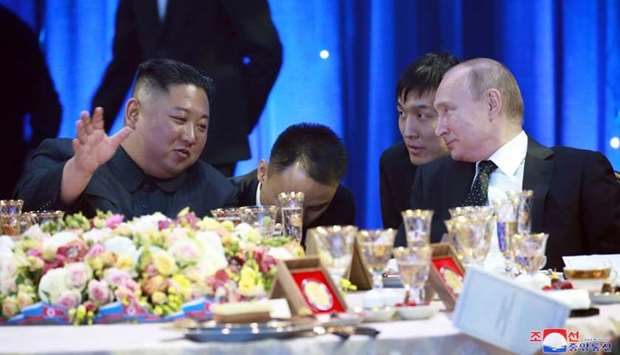North Korean leader Kim Jong Un and Russian President Vladimir Putin attend an official reception following their talks in Vladivostok, Russia yesterday. KCNA via REUTERS