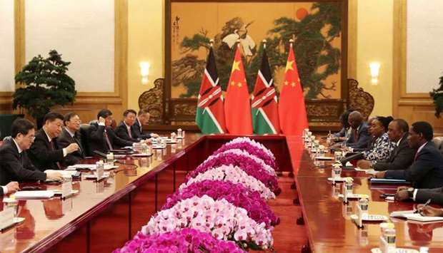 Kenyan President Uhuru Kenyatta and Chinese President Xi Jinping attend the meeting at the Great Hall of People in Beijing