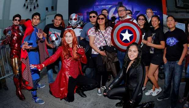 Avengers fans gather at the TCL Chinese Theatre in Hollywood to attend the opening screening of ,Avengers: Endgame, on Thursday in Los Angeles, California