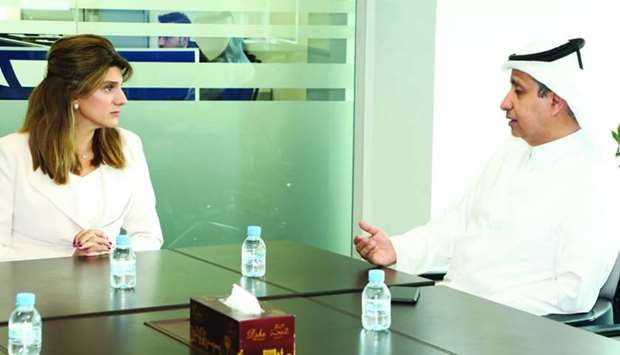 Princess Dina Mired of Jordan in discussion with Qatar Cancer Society chairman Sheikh Dr Khalid bin Jabor al-Thani.