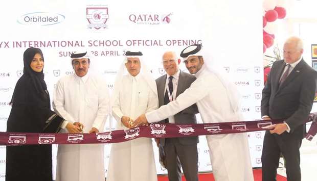 HE the Minister of Transport and Communications Jassim Seif Ahmed al-Sulaiti and Qatar Airways Group chief executive HE Akbar al-Baker cut a ribbon during the official opening ceremony, yesterday. PICTURES: Jayan Orma