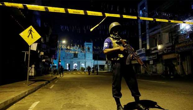 Security forces stand guard at St. Antony shrine